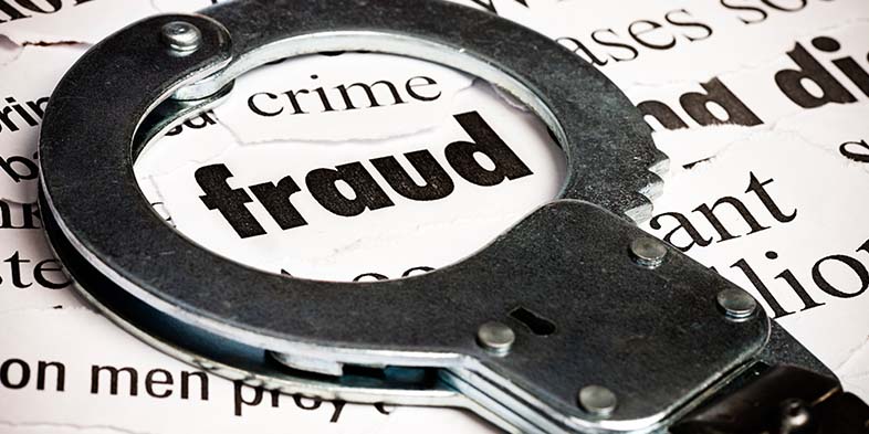 Hancuffs and the word "Fraud"