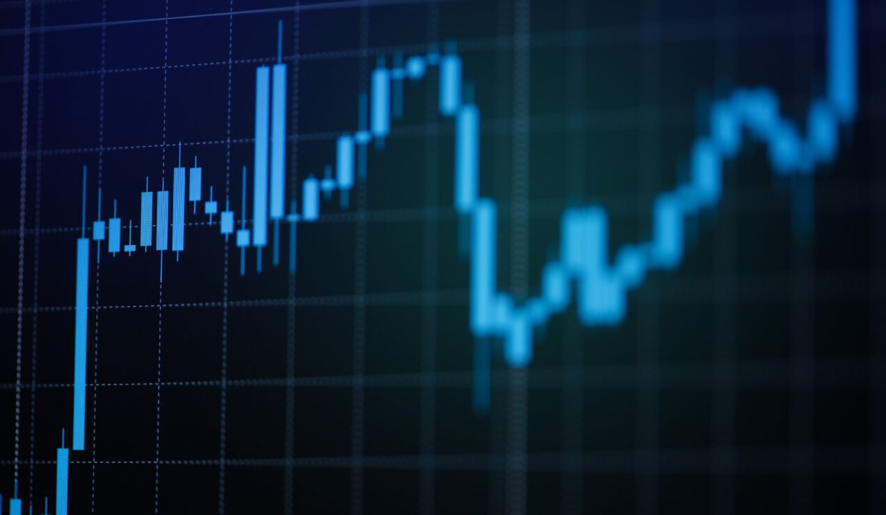 Candle stick charts stock or forex trading indicator on computer monitor for investors