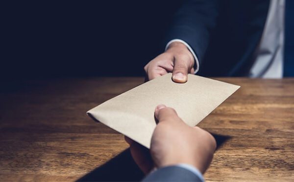 Whistleblower pleads guilty to bribery, denied whistleblower award