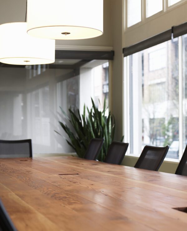 Conference table and chairs in boardroom